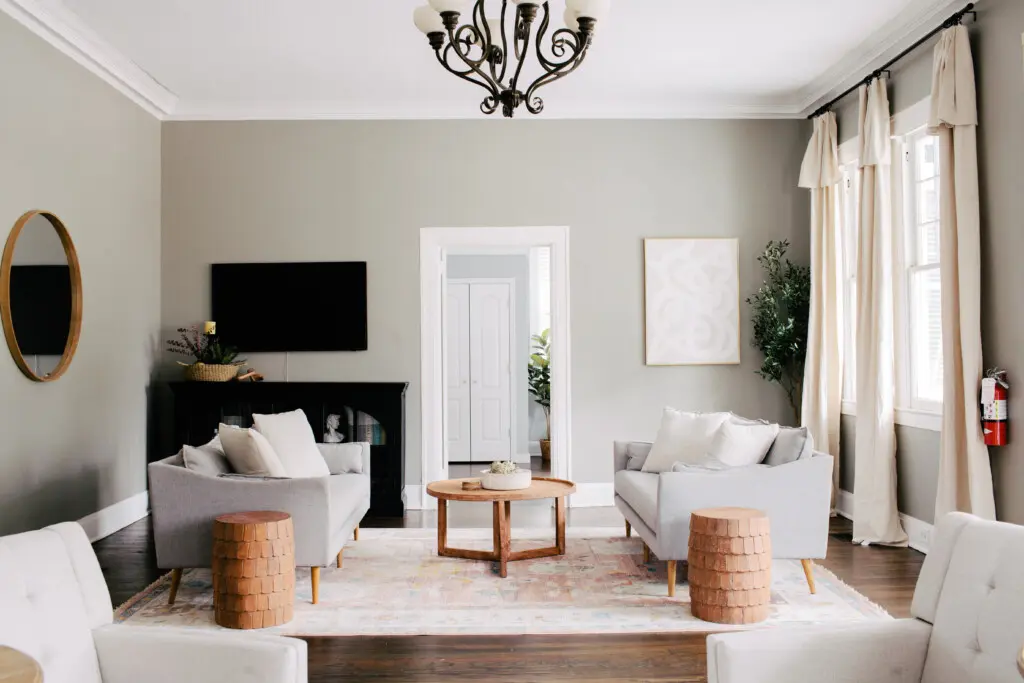 Living room seating and coffee table featured in Dreamline Suites home