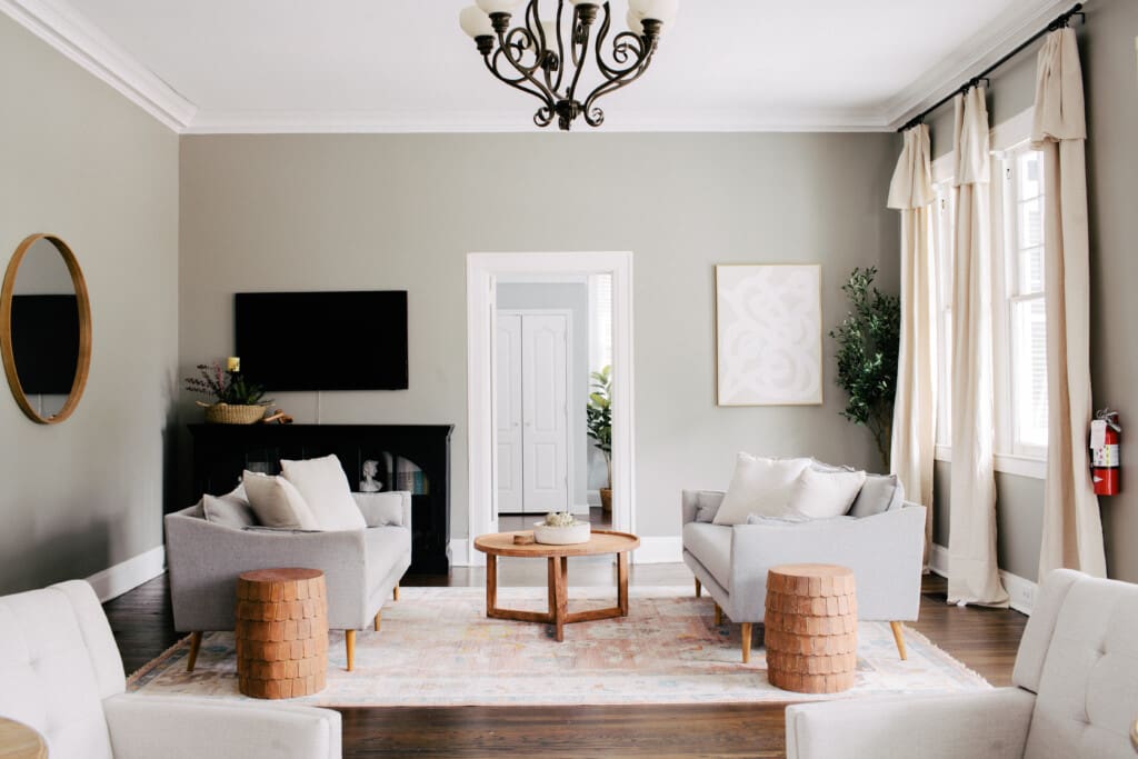 Living room seating and coffee table featured in Dreamline Suites home